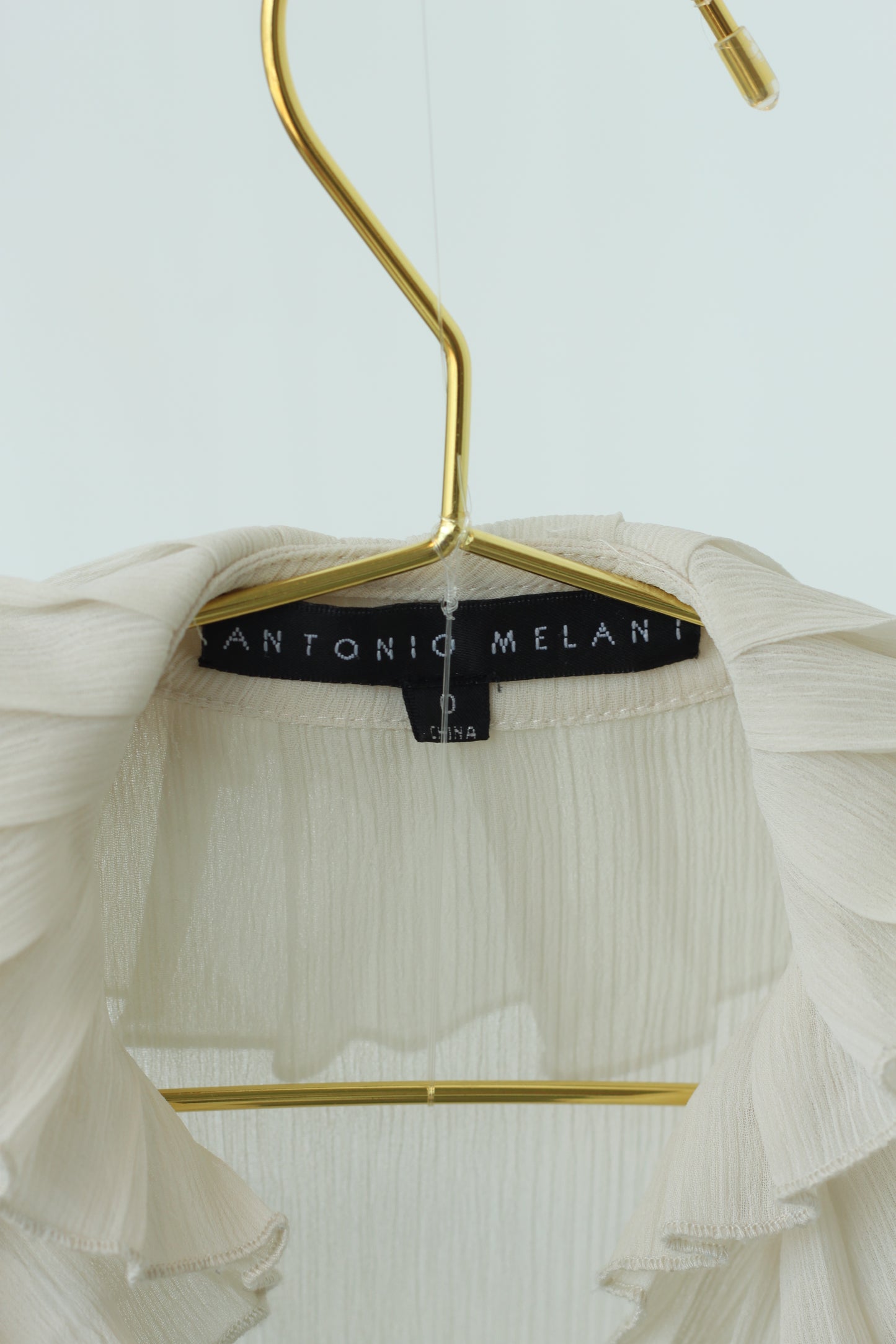 Cream Colored Flowy Blouse