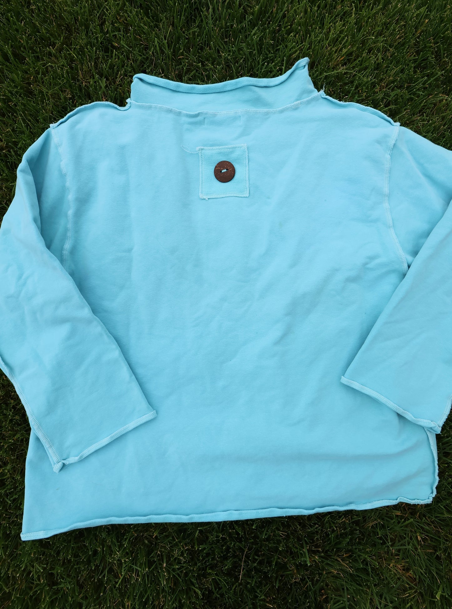 Unique Coastal Stitched Mock Neck Sweater